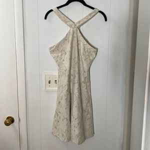 Nude white lace criss cross halter zip back dress